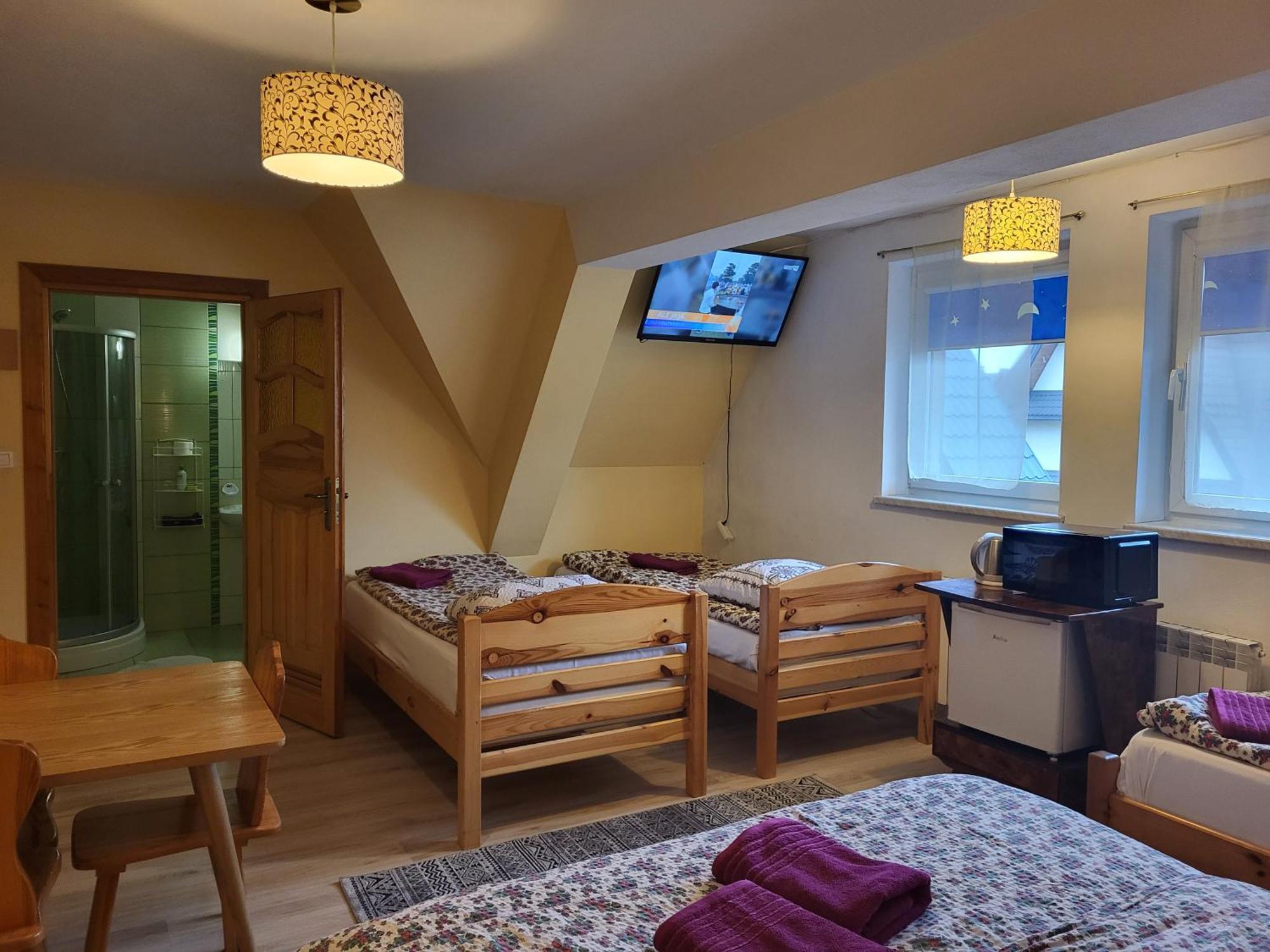 Apartamenty I Pokoje Goscinne Nowita Zakopane Kamer foto